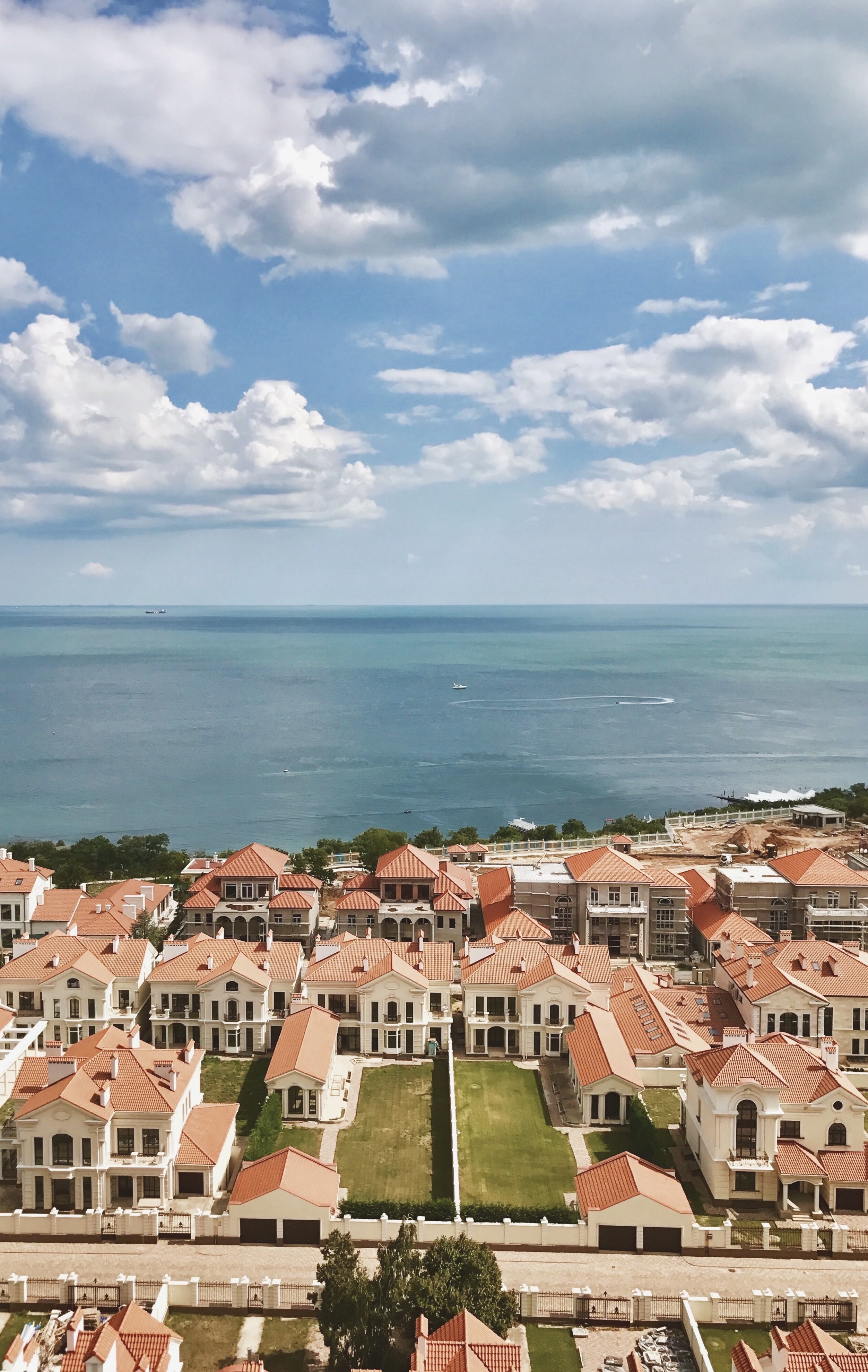 sky, sea and roof tops